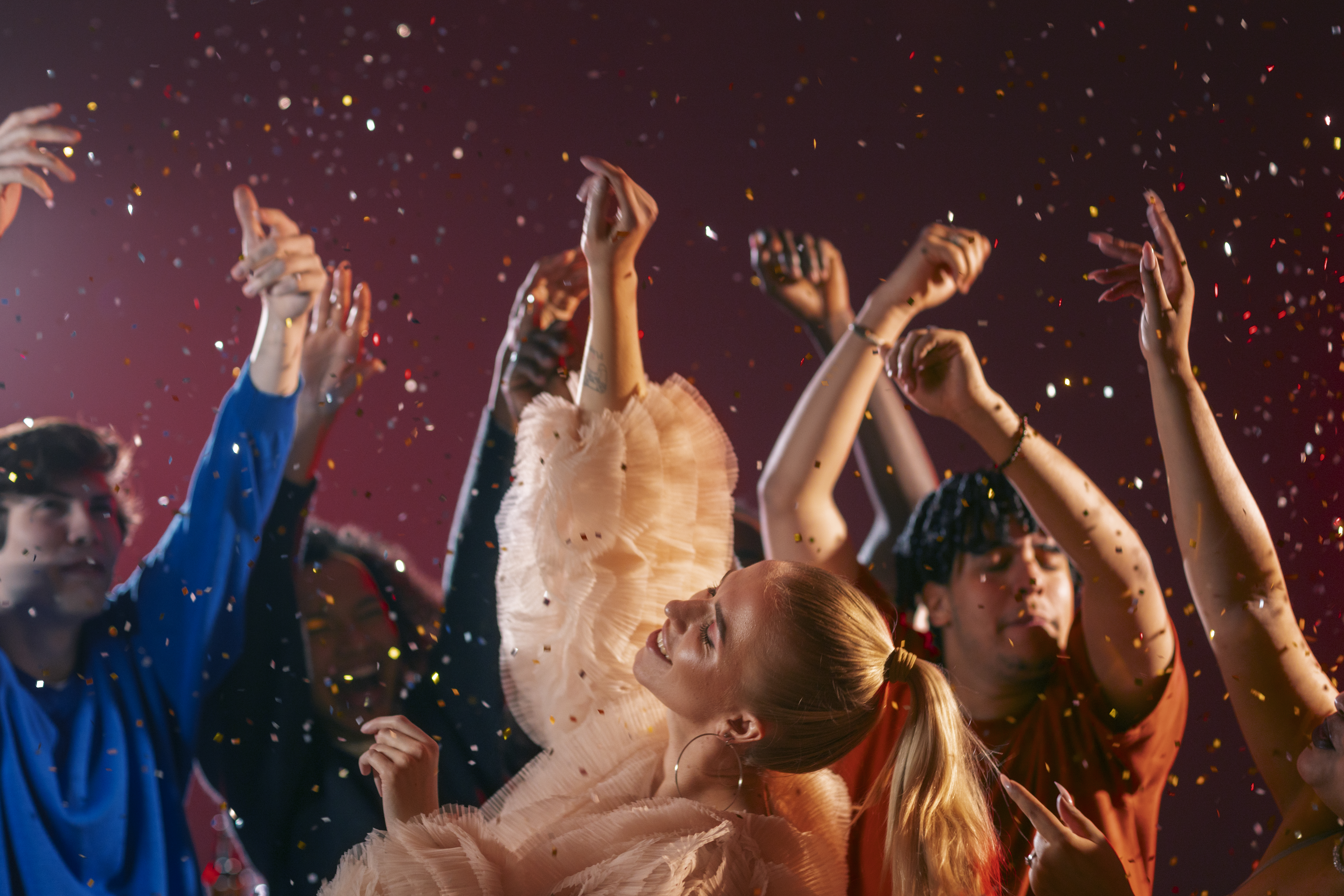 medium-shot-young-people-having-fun-party